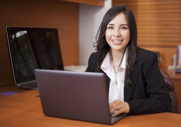 Happy,Latin,Businesswoman,Doing,Some,Work